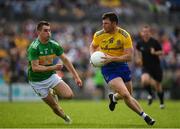 12 May 2019; Diarmuid Murtagh of Roscommon in action against Paddy Maguire of Leitrim during the Connacht GAA Football Senior Championship Quarter-Final match between Roscommon and Leitrim at Dr Hyde Park in Roscommon. Photo by Seb Daly/Sportsfile