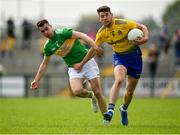 12 May 2019; Shane Killoran of Roscommon in action against Paddy Maguire of Leitrim during the Connacht GAA Football Senior Championship Quarter-Final match between Roscommon and Leitrim at Dr Hyde Park in Roscommon. Photo by Seb Daly/Sportsfile