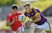 12 May 2019; Jonathan Bealin of Wexford in action against Emmet Carolan of Louth during the Leinster GAA Football Senior Championship Round 1 match between Wexford and Louth at Innovate Wexford Park in Wexford.   Photo by Matt Browne/Sportsfile