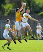 12 May 2019; Adam Flanagan of Meath in action against Johnny Moloney, right, and Eoin Carroll of Offaly during the Leinster GAA Football Senior Championship Round 1 match between Meath and Offaly at Páirc Tailteann, Navan in Meath. Photo by Brendan Moran/Sportsfile