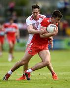 12 May 2019; Shane McGuigan of Derry in action against Colm Cavanagh of Tyrone during the Ulster GAA Football Senior Championship preliminary round match betweenTyrone and Derry at Healy Park, Omagh in Tyrone. Photo by Oliver McVeigh/Sportsfile