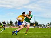 12 May 2019; Conor Devaney of Roscommon in action against Dean McGovern of Leitrim during the Connacht GAA Football Senior Championship Quarter-Final match between Roscommon and Leitrim at Dr Hyde Park in Roscommon. Photo by Seb Daly/Sportsfile