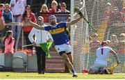 12 May 2019; John McGrath of Tipperary celebrates after scoring his side's second goal past Cork goalkeeper Anthony Nash during the Munster GAA Hurling Senior Championship Round 1 match between Cork and Tipperary at Pairc Ui Chaoimh in Cork. Photo by Diarmuid Greene/Sportsfile