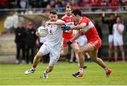 12 May 2019; Matthew Donnelly of Tyrone in action against Christopher McKaigue of Derry during the Ulster GAA Football Senior Championship preliminary round match between Tyrone and Derry at Healy Park, Omagh in Tyrone. Photo by Oliver McVeigh/Sportsfile