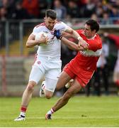 12 May 2019; Matthew Donnelly of Tyrone in action against Christopher McKaigue of Derry during the Ulster GAA Football Senior Championship preliminary round match between Tyrone and Derry at Healy Park, Omagh in Tyrone. Photo by Oliver McVeigh/Sportsfile