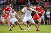 12 May 2019; Matthew Donnelly of Tyrone in action against Christopher McKaigue of Derry during the Ulster GAA Football Senior Championship preliminary round match between Tyrone and Derry at Healy Park, Omagh in Tyrone. Photo by Oliver McVeigh/Sportsfile