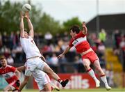 12 May 2019; Richard Donnelly of Tyrone  in action against Jason Rocks of Derry during the Ulster GAA Football Senior Championship preliminary round match between Tyrone and Derry at Healy Park, Omagh in Tyrone. Photo by Oliver McVeigh/Sportsfile