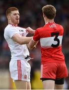 12 May 2019; Cathal McShane of Tyrone and Brendan Rogers of Derry react during the Ulster GAA Football Senior Championship preliminary round match between Tyrone and Derry at Healy Park, Omagh in Tyrone. Photo by Oliver McVeigh/Sportsfile