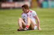 12 May 2019; Peter Harte of Tyrone on the ground injured during the Ulster GAA Football Senior Championship preliminary round match between Tyrone and Derry at Healy Park, Omagh in Tyrone. Photo by Oliver McVeigh/Sportsfile