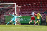 12 May 2019; Alastair Dunne of Douglas Hall scores the opening goal of the game during the U13 SFAI Cup Final 2019 match between Douglas Hall and Leixlip United at Turners Cross in Cork. Photo by Michael P. Ryan/Sportsfile