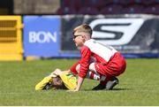 12 May 2019; Riley Houghton of Leixlip United consoles Ronan Dooley of Douglas Hall at the end of the U13 SFAI Cup Final 2019 match between Douglas Hall and Leixlip United at Turners Cross in Cork. Photo by Michael P. Ryan/Sportsfile