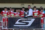 12 May 2019; Chairman of the SFAI John Early presents the trophy to Leixlip United following the U13 SFAI Cup Final 2019 match between Douglas Hall and Leixlip United at Turners Cross in Cork. Photo by Michael P. Ryan/Sportsfile