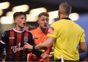 10 May 2019; Bohemians players Andy Lyons, left, and James Talbot remonstrate with referee Ben Connolly after a penalty was awarded to Dundalk during the SSE Airtricity League Premier Division match between Bohemians and Dundalk at Dalymount Park in Dublin. Photo by Ben McShane/Sportsfile