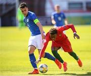13 May 2019; Pedro Brazão of Portugal in action against Simone Panada of Italy during the 2019 UEFA European Under-17 Championships quarter-final match between Italy and Portugal at Tolka Park in Dublin. Photo by Stephen McCarthy/Sportsfile