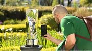 13 May 2019; Adam Thompson of the FAI photographs the new trophy at the Unite the Union Champions Cup Launch in the Grand Hotel in Malahide, Dublin. Photo by Ray McManus/Sportsfile