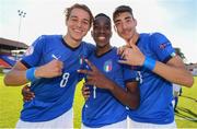 13 May 2019; Italy players, from left, Nikola Sekulov, Franco Tongya of Italy, and Alessandro Pio Riccio celebrate following the 2019 UEFA European Under-17 Championships Quarter-Final match between Italy and Portugal at Tolka Park in Dublin. Photo by Stephen McCarthy/Sportsfile