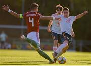 13 May 2019; Robert Navarro Muñoz of Spain in action against Patrick Posztobányi of Hungary during the 2019 UEFA European Under-17 Championships Quarter-Final match between Hungary and Spain at UCD Bowl in Dublin. Photo by Ben McShane/Sportsfile