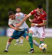 13 May 2019; Yeremi Jesús Pino Santos of Spain in action against Gábor Buna of Hungary during the 2019 UEFA European Under-17 Championships Quarter-Final match between Hungary and Spain at UCD Bowl in Dublin. Photo by Ben McShane/Sportsfile