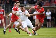 12 May 2019; Matthew Donnelly of Tyrone in action against Christopher McKaigue of Derry during the Ulster GAA Football Senior Championship preliminary round match betweenTyrone and Derry at Healy Park, Omagh in Tyrone. Photo by Oliver McVeigh/Sportsfile