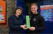 15 May 2019; James Talbot of Bohemians is presented with his SSE Airtricity/SWAI Player of the Month award for April by SSE Airtricity Digital Marketing Lead Ruth Ryan at St Gabriel's National School in Stoneybatter, Dublin. Photo by Brendan Moran/Sportsfile