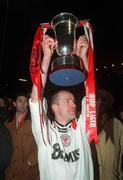 24 February 1998; Sligo Rovers player/manager Nicky Reid lifts the trophy following the Harp Lager League Cup Final 2nd Leg match between Shelbourne and Sligo Rovers at Tolka Park in Dublin. Photo by David Maher/Sportsfile