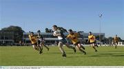 21 October 2003; Kevin Cassidy, Ireland, in action against Western Australia's Shaun Hildebrant, left, and Kevin O'Brien. Foster's International Rules, Preparation match, Western Australia v Ireland, Swan Districts Football Club, Bassendean Oval, Bassendean, Perth, Western Australia. Picture credit; Ray McManus / SPORTSFILE *EDI*
