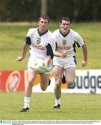 22 October 2003; Thomas Freeman, supported by team captain Graham Canty, during a training session in preparation for the Foster's International Rules game  between Australia and Ireland, Swan Districts Football Club, Bassendean Oval, Bassendean, Perth, Western Australia. Picture credit; Ray McManus / SPORTSFILE *EDI*