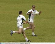 22 October 2003; Kevin Hughes takes a pass from Odhran O'Dwyer during a training session in preparation for the Foster's International Rules game between Australia and Ireland, Swan Districts Football Club, Bassendean Oval, Bassendean, Perth, Western Australia. Picture credit; Ray McManus / SPORTSFILE *EDI*