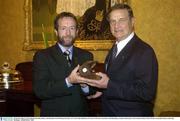 22 October 2003; GAA President Sean Kelly makes a presentation, of an Irish bog oak clock, to Lt. Gen. John Sanderson, Governor of Western Australia, at the Reception, to honour both teams, in Government House, Perth, Western Australia. Picture credit; Ray McManus / SPORTSFILE *EDI*