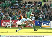 26 October 2003; Alan Quinlan, Ireland, charges for the line to score the only try of the game holding off the challenge of Argentina's Ignacio Corleto. 2003 Rugby World Cup, Pool A, Ireland v Argentina, Adelaide Oval, Adelaide, South Australia, Australia. Picture credit; Brendan Moran / SPORTSFILE *EDI*