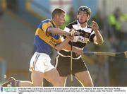 26 October 2003; Ciaran Carey, Patrickswell, in action against Clarecastle's Conor Plunkett. AIB Munster Club Senior Hurling Championship Quarter-Final, Clarecastle v Patrickswell, Cusack Park, Ennis, Co. Clare. Picture credit; Matt Browne / SPORTSFILE *EDI*