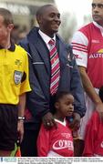 26 October 2003; Charles Livingstone Mbabazi, St. Patrick's Athletic with his daughter Shivuan before the start of the game. FAI Carlsberg Cup Final, Longford Town v St. Patrick's Athletic, Lansdowne Road, Dublin. Soccer. Picture credit; David Maher / SPORTSFILE *EDI*