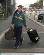 27 October 2003; Thomas Freeman on the teams departure from Perth en-route to Melbourne prior to the Fosters International Rules game between Australia and Ireland. Perth Domestic Airport, Perth, Western Australia, Australia. Picture credit; Ray McManus / SPORTSFILE *EDI*