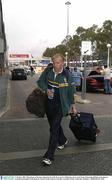 27 October 2003; Shane Ryan on the teams departure from Perth en-route to Melbourne prior to the Fosters International Rules game between Australia and Ireland. Perth Domestic Airport, Perth, Western Australia, Australia. Picture credit; Ray McManus / SPORTSFILE *EDI*