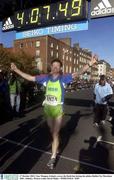 27 October 2003; Tony Mangan, Ireland, crosses the finish line during the adidas Dublin City Marathon 2003. Athletics. Picture credit; David Maher / SPORTSFILE *EDI*
