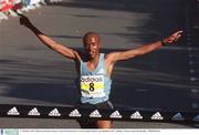 27 October 2003; Onesmus Kilonzo, Kenya, crosses the finish line to win the adidas Dublin City Marathon 2003. Athletics. Picture credit; Pat Murphy / SPORTSFILE