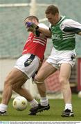 28 October 2003; Cormac McAnallen is tackled by Kevin cassidy during &quot;some ground work&quot; at a training session in prepatation for the Fosters International Rules game between Australia and Ireland. Melbourne Cricket Grounds, Melbourne, Australia. Picture credit; Ray McManus / SPORTSFILE *EDI*