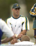 28 October 2003; Australian lock Nathan Sharpe listens to coach Eddie Jones during squad training. 2003 Rugby World Cup, Australian squad training, Richmond Oval, Melbourne, Victoria, Australia. Picture credit; Brendan Moran / SPORTSFILE *EDI*