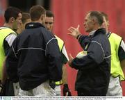 29 October 2003; Irish manager John O'Keeffe talking to Graham Canty, left, Kieran McGeeney, Paddy Christie, Cormac McAnallen and Paul McGrane during a training session in prepatation for the Fosters International Rules game between Australia and Ireland. Melbourne Cricket Grounds, Melbourne, Australia. Picture credit; Ray McManus / SPORTSFILE *EDI*