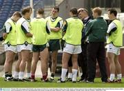 29 October 2003; Irish manager John O'Keeffe, in the company of Cathal Caly, Cormac McAnallen, Graham Canty, Paddy Christie, Anthony Lynch, Sean Marty Lockhart and Kevin Hughes, listen to Kieran McGeeney during a training session in prepatation for the Fosters International Rules game between Australia and Ireland. Melbourne Cricket Grounds, Melbourne, Australia. Picture credit; Ray McManus / SPORTSFILE *EDI*