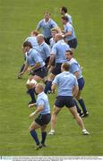 30 October 2003; Ireland players, from bottom of frame, Peter Stringer, Denis Hickie, Keith Gleeson, Donnacha O'Callaghan, John Hayes, Keith Wood, Brian O'Driscoll, Paul O'Connell, Ronan O'Gara, Eric Miller and Girvan Dempsey in action during squad training. 2003 Rugby World Cup, Irish squad training, Whitton Oval, Melbourne, Victoria, Australia. Picture credit; Brendan Moran / SPORTSFILE *EDI*