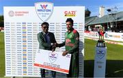 15 May 2019; Uday Hakim, of Walton, presents Abu jahid chy rahi of Bangladesh with his player of the match award after the One Day International match between Ireland and Bangladesh at Clontarf Cricket Club, Clontarf in Dublin.     Photo by Piaras Ó Mídheach/Sportsfile