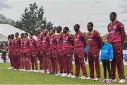 15 May 2019; The West Indies team and mascot Christina Troup, aged 6, during the national anthems ahead of the One-Day International Tri-Series Final match between West Indies and Bangladesh at Malahide Cricket Ground, Malahide, Dublin. Photo by Sam Barnes/Sportsfile