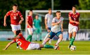 13 May 2019; Beñat Turrientes Imaz of Spain in action against Botond Balogh of Hungary during the 2019 UEFA European Under-17 Championships Quarter-Final match between Hungary and Spain at UCD Bowl in Dublin. Photo by Ben McShane/Sportsfile