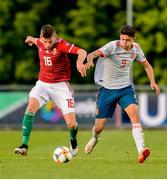 13 May 2019; Gergo Ominger of Hungary in action against Jordi Escobar Fernández of Spain during the 2019 UEFA European Under-17 Championships Quarter-Final match between Hungary and Spain at UCD Bowl in Dublin. Photo by Ben McShane/Sportsfile