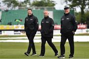 15 May 2019; Umpires Richard Kettleborough, left, Paul Reynolds, centre, and Reserve Umpire Mark Hawthorne conduct a pitch inspection after rain stopped play during the One-Day International Tri-Series Final match between West Indies and Bangladesh at Malahide Cricket Ground, Malahide, Dublin. Photo by Sam Barnes/Sportsfile