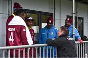 15 May 2019; Umpire Richard Kettleborough in conversation with West Indies head coach Floyd Reifer, centre, and West Indies players, after rain stopped play during the One-Day International Tri-Series Final match between West Indies and Bangladesh at Malahide Cricket Ground, Malahide, Dublin. Photo by Sam Barnes/Sportsfile