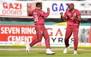 15 May 2019; Sheldon Cottrell of West Indies, left, celebrates with Jason Holder after catching out Soumya Sarkar of Bangladesh during the One-Day International Tri-Series Final match between West Indies and Bangladesh at Malahide Cricket Ground, Malahide, Dublin. Photo by Sam Barnes/Sportsfile