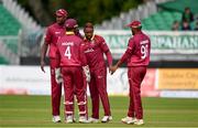 15 May 2019; Fabian Allen of West Indies, centre, celebrates with team-mates after taking a wicket during the One-Day International Tri-Series Final match between West Indies and Bangladesh at Malahide Cricket Ground, Malahide, Dublin. Photo by Sam Barnes/Sportsfile