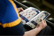 12 May 2019; A Tipperary supporter reads their match programme prior to the Munster GAA Hurling Senior Championship Round 1 match between Cork and Tipperary at Pairc Ui Chaoimh in Cork. Photo by Diarmuid Greene/Sportsfile